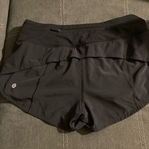 Lululemon black running shorts with pocket in back